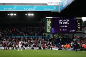 A general view inside the stadium as the LED screen displays a VAR check at Elland Road. Picture: George Wood/Getty Images.