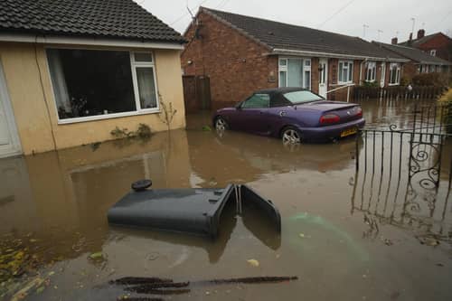 A house surrounded by floodwater in Fishlake, Doncaster, in 2019. PIC: PA