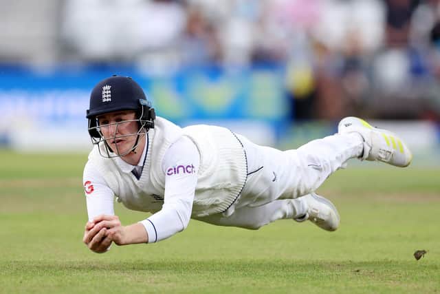 Yorkshire and England's Harry Brook is at full stretch to catch Australia's Mitchell Starc on a weather-affected third day of the Headingley Test. Photo by Richard Heathcote/Getty Images.