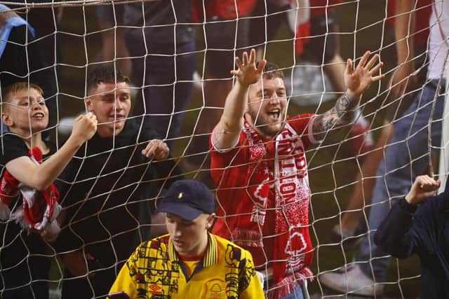 UNPLEASANT SCENES: Many Nottingham Forest fans came onto the field after their side knocked Sheffield United out of last season's Championship play-offs