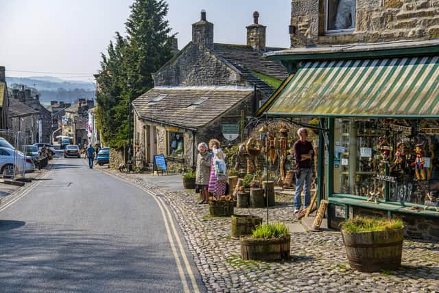Shops, businesses and puns in rural villages, such as Grassington in the Yorkshire Dales National Park, will thrive under devolved powers says the boss of the country's biggest housing association. Picture Tony Johnson.