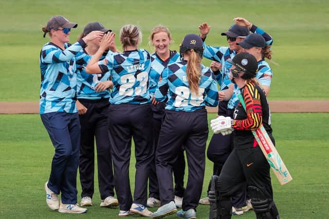 ON YOUR WAY: Northern Diamonds’ Katie Levick celebrates with team-mates after taking the wicket of Sunrisers’ Alice Macleod. Picture by Alex Whitehead/SWpix.com