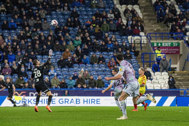 Terriers forward Martyn Waghorn lobs Canaries keeper Angus Gunn to score an equaliser. Picture: Tony Johnson. 15 March 2023.