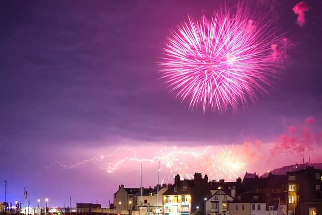 Spectacular stormy weather struck at the same time as a firework display to mark the end of a regatta on the Yorkshire coast to light up the night sky. Photographer David Kirtlan captured the moment the lightning coincided with the fireworks over Whitby harbour after the town's annual regatta.