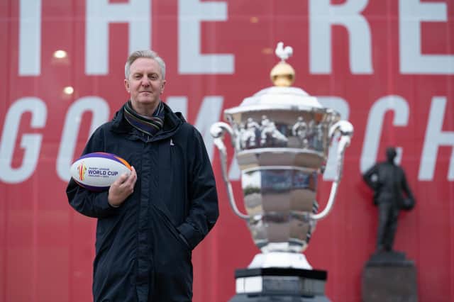 Poet Tony Walsh, aka Longfella, outside Old Trafford in Manchester to mark the one year countdown to the tournament. (Pic: PA)