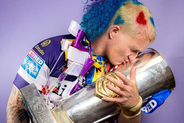 Caius Faatili of Wakefield celebrates with the Betfred Super League trophy (Picture: Alex Whitehead/SWpix.com)