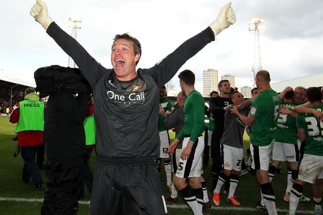 Those were the days: Doncaster Rovers' Neil Sullivan and his team-mates celebrate winning the League One title in a stunning finale at Brentford (Picture: Sean Dempsey/PA)