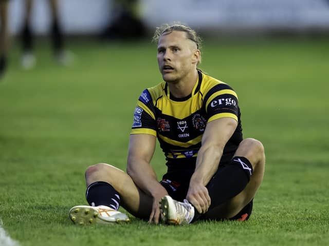 Jacob Miller dejected as his side concede their third try against St Helens. (Photo: Allan McKenzie/SWpix.com)