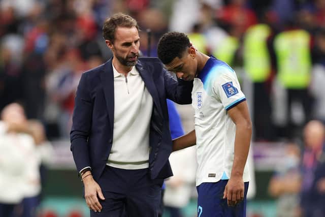 AL KHOR, QATAR - DECEMBER 10: Gareth Southgate, Head Coach of England, embraces Jude Bellingham after the 1-2 loss during the FIFA World Cup Qatar 2022 quarter final match between England and France at Al Bayt Stadium on December 10, 2022 in Al Khor, Qatar. (Photo by Richard Heathcote/Getty Images)