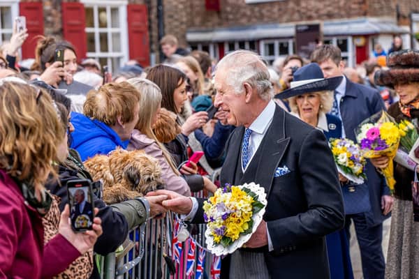 King Charles III and the Queen Consort meet members of the public during the Royal Maundy Service at York Minster. Picture date: Thursday April 6, 2023.