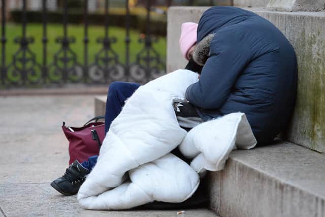A homeless person trying to keep warm
Photo credit should read: Nick Ansell/PA Wire