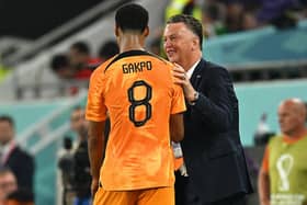 Cody Gakpo of Netherlands celebrates with Louis van Gaal, head coach of Netherlands, after scoring their team's first goal during the FIFA World Cup Qatar 2022 Group A match against Senegal (Picture: Stuart Franklin/Getty Images)