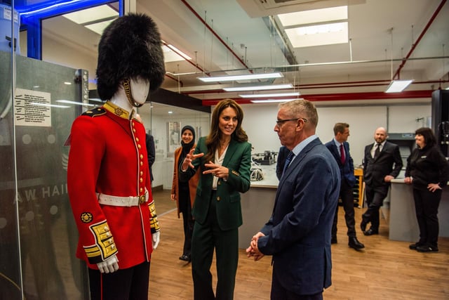Her Royal Highness The Princess of Wales looking at one of the fabric's made for the Coldstream Guards Uniform. Picture By Yorkshire Post Photographer,  James Hardisty.