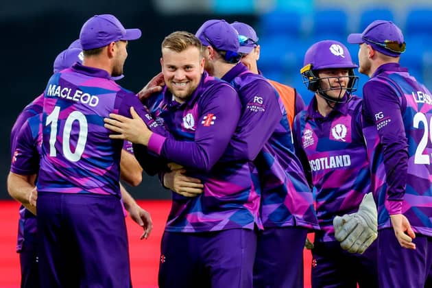 Scotlands Mark Watt (C) celebrates with teammates during the Australia 2022 Twenty20 World Cup cricket tournament match between West Indies and Scotland at Bellerive Oval in Hobart (Picture: DAVID GRAY/AFP via Getty Images)