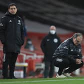 Marcelo Bielsa, manager of Leeds United, and coach Pablo Quiroga look dejected during the Premier League match between Arsenal and Leeds United at Emirates Stadium on February 14, 2021.