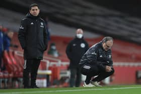 Marcelo Bielsa, manager of Leeds United, and coach Pablo Quiroga look dejected during the Premier League match between Arsenal and Leeds United at Emirates Stadium on February 14, 2021.