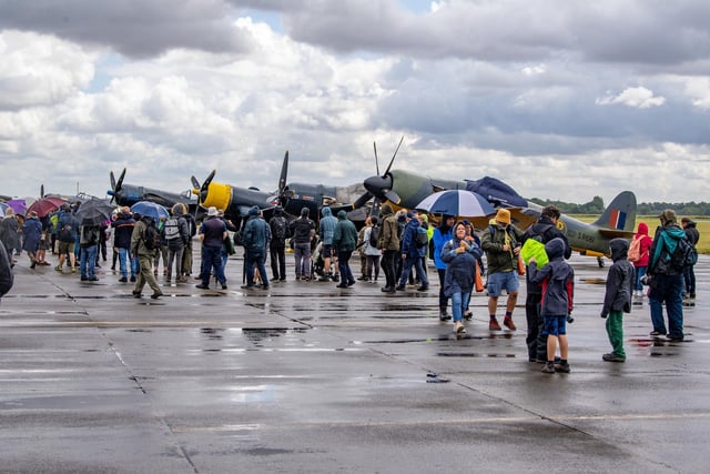 Visitors view the warbirds