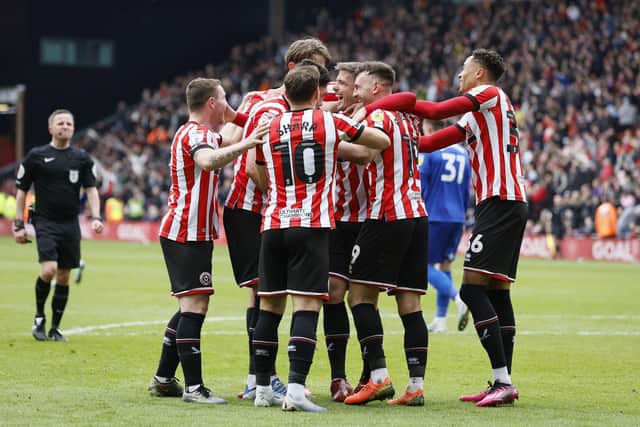 Sheffield United's Ciaran Clark (centre) celebrates scoring their side's fourth goal of the game during the Sky Bet Championship match at Bramall Lane, Sheffield. Picture date: Saturday April 15, 2023. PA Photo. See PA story SOCCER Sheff Utd. Photo credit should read: Richard Sellers/PA Wire.

RESTRICTIONS: EDITORIAL USE ONLY No use with unauthorised audio, video, data, fixture lists, club/league logos or "live" services. Online in-match use limited to 120 images, no video emulation. No use in betting, games or single club/league/player publications.