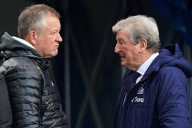 WISE OLD HEADS: Chris Wilder talks to Crystal Palace's former England manager Roy Hodgson in 2021