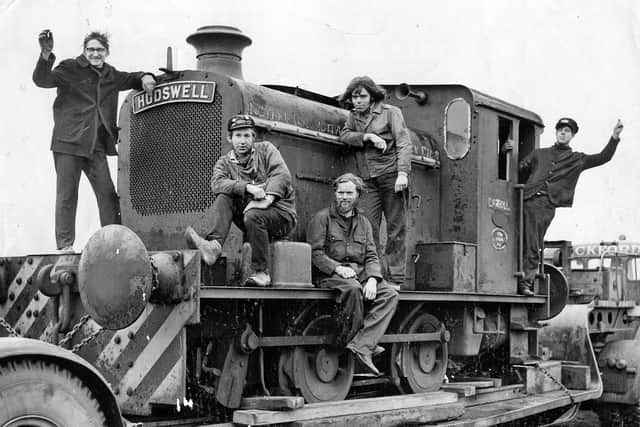 Leeds, Middleton, December 1969. Members of Middleton Railway Trust are seen here aboard their latest acquisition - a deisel locomotive built by Hudswell Clarke, of Leeds, which started life 23 years ago shunting at Keighley gas works. Left to right; David Alexander, Bill Greenhalgh, Tim Leech, Charlie Milner and Malcolm Phillips.