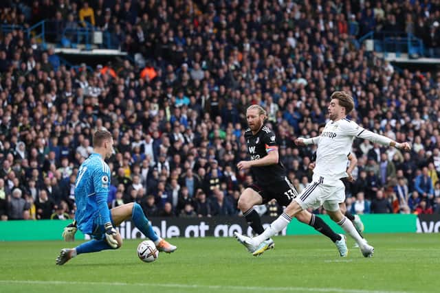 LEEDS, ENGLAND - OCTOBER 23: Patrick Bamford of Leeds United misses a chance under pressure from Bernd Leno (L) and Tim Ream of Fulham (C) during the Premier League match between Leeds United and Fulham FC at Elland Road on October 23, 2022 in Leeds, England. (Photo by George Wood/Getty Images)