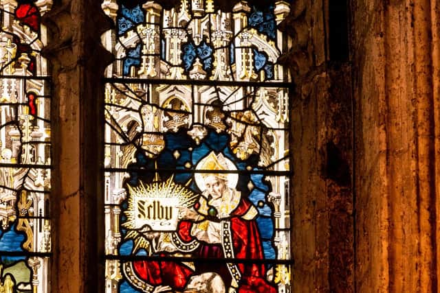 The St Germain window in the North Transept of Selby Abbey is one of the most spectacular and impressive stained glass in the Abbey. It contains 46 scenes from the life and legend of the saint, to whom, with Our Lord and St Mary, the Abbey was dedicated. Picture By Yorkshire Post Photographer,  James Hardisty.