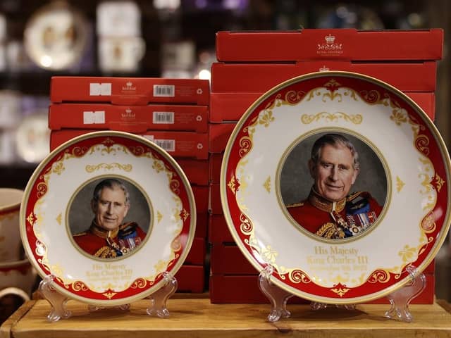 King Charles III plates for sale ahead of his Coronation. (Pic credit: Hollie Adams / Getty Images)