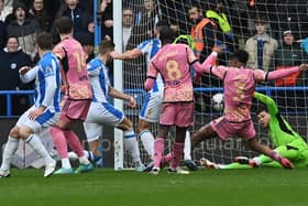 Huddersfield Town's Michal Helik converts from close range to put the hosts in front against Leeds United. Picture: Jonathan Gawthorpe.