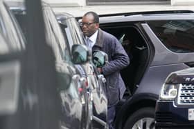 Chancellor of the Exchequer Kwasi Kwarteng arrives in Downing Street, London, after returning from the US ahead of schedule for urgent talks with Prime Minister Liz Truss as expectations grow that they will scrap parts of their mini-budget to reassure markets. Picture date: Friday October 14, 2022.
