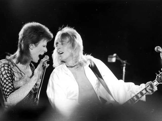 David Bowie performing with guitarist Mick Ronson  at a live recording of 'The 1980 Floor Show'. (Photo by Jack Kay/Daily Express/Getty Images)