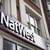 NatWest has upgraded expectations for the year as the company’s mortgage book grew and the chief executive said the bank is seeing “no signs” of families in added financial distress.
