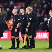 UNHAPPY: Sheffield United manager Chris Wilder, confronts referee Simon Hooper at full-time following the 2-0 Premier League defeat at home to Liverpool