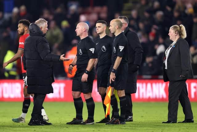 UNHAPPY: Sheffield United manager Chris Wilder, confronts referee Simon Hooper at full-time following the 2-0 Premier League defeat at home to Liverpool
