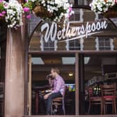 The chairman of Wetherspoon, Tim Martin, said: "Profits for the year are likely to be below market expectations, with marginally lower sales than anticipated in the final quarter, combined with higher costs in the areas of food, labour, repairs, energy and business rates." (Photo by Victoria Jones/PA Wire)