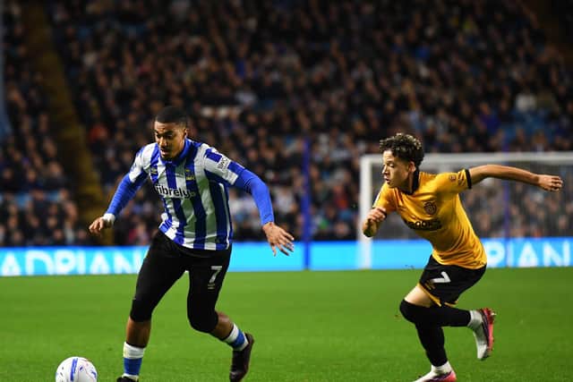 Sheffield Wednesday's Yan Valery takes on Cambridge United's Issac Heath. Picture: Steve Ellis