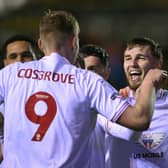 Barnsley player John McAtee (2nd r) celebrates the second goal with the creator Sam Cosgrove during the Sky Bet League One match with Carlisle United at Brunton Park. (Photo by Stu Forster/Getty Images)