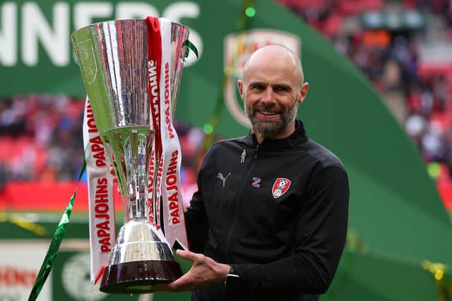 Paul Warne poses for a photo with the Papa John's Trophy following victory in the Papa John's Trophy Final between Rotherham United and Sutton United at Wembley. Picture: Catherine Ivill/Getty Images.