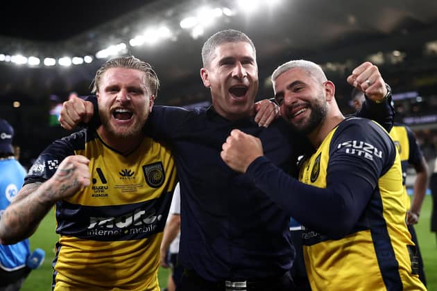 Central Coast Mariners head coach Nick Montgomery (C) celebrates with Jason Cummings (L) and Christian Theoharous (R) of the Mariners after winning the 2023 A-League Men's Grand Final. Montgomery has been linked with the vacant Hibs job (Picture: Cameron Spencer/Getty Images)