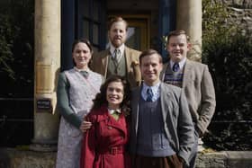 All Creatures Great and Small Series 7: L-R clockwise: Samuel West (Siegfried Farnon), Callum Woodhouse (Tristan Farnon), Nicholas Ralph (James Herriot), Rachel Shenton (Helen Herriot), Anna Madeley (Mrs Hall) outside Skeldale House. Picture: Helen Williams ©5 Broadcasting Limited / © Playground Television UK Ltd 2026