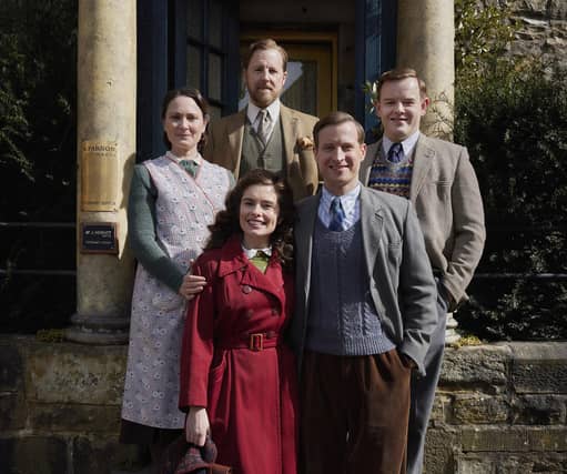 All Creatures Great and Small Series 7: L-R clockwise: Samuel West (Siegfried Farnon), Callum Woodhouse (Tristan Farnon), Nicholas Ralph (James Herriot), Rachel Shenton (Helen Herriot), Anna Madeley (Mrs Hall) outside Skeldale House. Picture: Helen Williams ©5 Broadcasting Limited / © Playground Television UK Ltd 2026