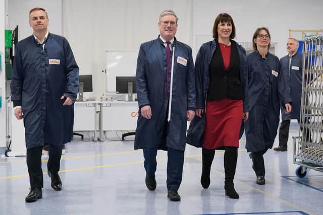 Leader of the Labour Party Sir Keir Starmer  and shadow chancellor Rachel Reeves during their tour of production facilities of the fuel cell manufacturer, Ceres Power, in Surrey, with Chief Technical Officer Caroline Hargrove (right), CEO Phil Caldwell (left). Picture date: Monday March 13, 2023. PA Photo. Photo credit should read: Jonathan Brady/PA Wire 