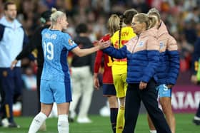 Not this time: Barnsley-born striker Bethany England, left, is consoled by England head coach Sarina Wiegman after their World Cup final defeat to Spain. (Picture: Isabel Infantes/PA)