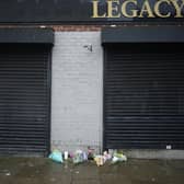 Police who have removed the bodies of 35 people and the suspected ashes of a number of others from a funeral directors have said they are investigating a “truly horrific incident”. Pictured: Floral tributes left outside the Hessle Road branch of Legacy Independent Funeral Directors.
