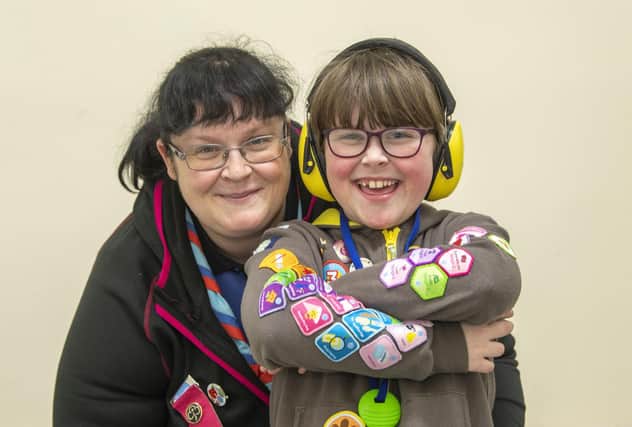 Freya-Rose Kent with mum Rachael at the  39th Rotherham Brownie Unit in Bramley. Her  life has been transformed since joining her local Brownie unit. Once non-verbal and only able to communicate in Makaton, her confidence is now sky high and she's made lifelong friends and gained every Brownie interest badge.
Picture Tony Johnson