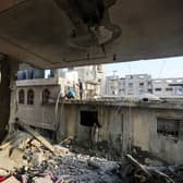 People search through buildings that were destroyed during Israeli air raids in the southern Gaza Strip on November 3, 2023. PIC: Ahmad Hasaballah/Getty Images