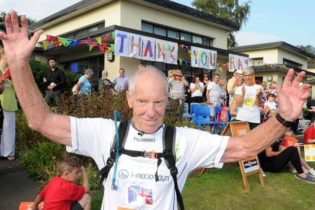 Ray Matthews finishes his 75th marathon at Newman School. Picture: Andrew Roe