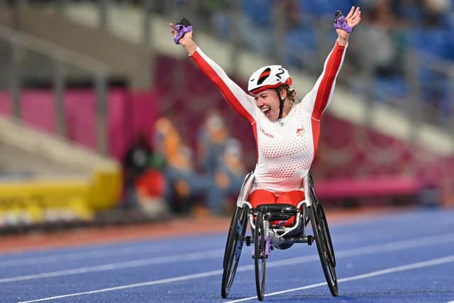 Halifax's Hannah Cockroft celebrates winning the para-women's 100m T33/34 final athletics event at the Alexander Stadium, in Birmingham on day five of the Commonwealth Games in Birmingham (Picture: GLYN KIRK/AFP via Getty Images)