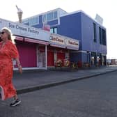 A woman walking. PIC: Jonathan Brady/PA Wire
