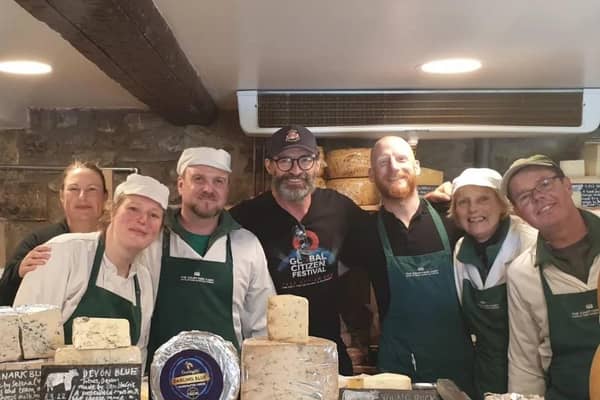 The Courtyard Dairy in Settle shared a photo of Hugh Jackman with cheesemongers