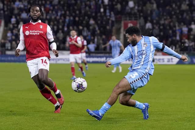 CROSSED PATH: Coventry City's Jay Dasilva crosses the ball past Rotherham United's Fred Onyedinma